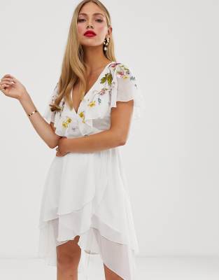 asos design midi dress with cape back and dipped hem in embellishment
