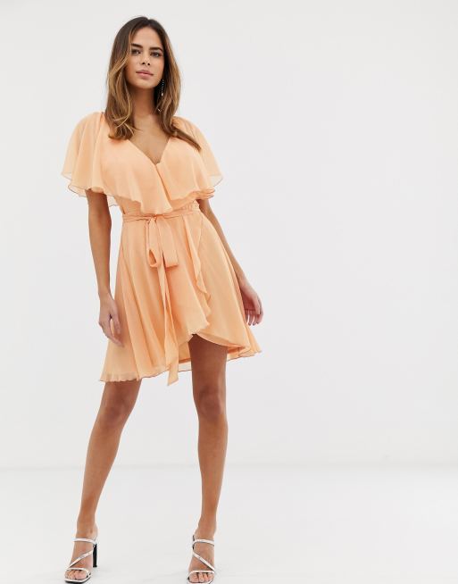 Cape back dipped store hem mini dress