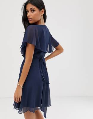 cape back dipped hem mini dress