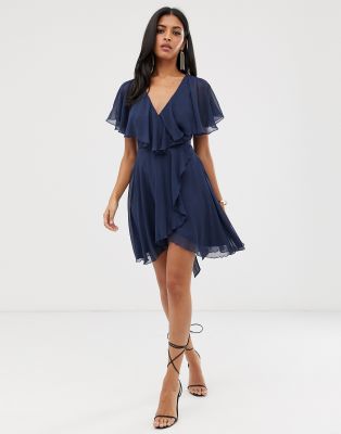cape back dipped hem mini dress