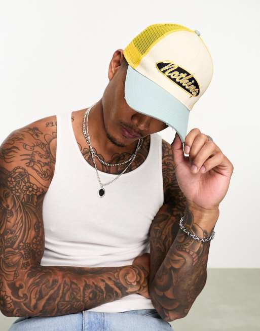 ASOS DESIGN - Cappellino trucker con logo ricamato multicolore