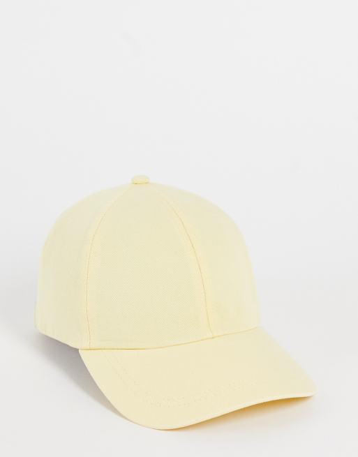 ASOS DESIGN - Cappello con visiera morbido color limone