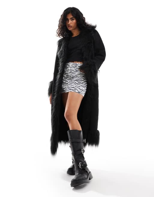 ASOS DESIGN - Cappotto taglio lungo in pelliccia e camoscio sintetici nero