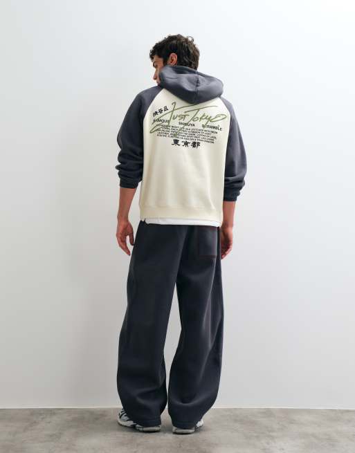 ASOS DESIGN cappuccio oversize con maniche raglan a contrasto, lavaggio acid wash e stampa in ecru, 2 di 5