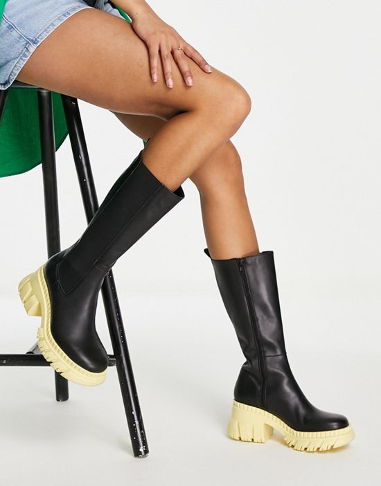https://images.asos-media.com/products/asos-design-capricorn-premium-leather-chunky-chelsea-knee-boots-in-black-with-yellow-sole/202107513-4?$n_550w$&wid=550&fit=constrain