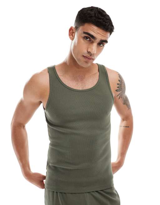 ASOS DESIGN capsule collection rib muscle fit tank top with mid scoop in dark green