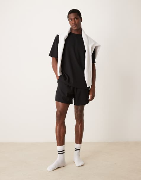 ASOS DESIGN - Capsule Collection - Sort lounge-sæt med afslappet T-shirt og shorts - view 1
