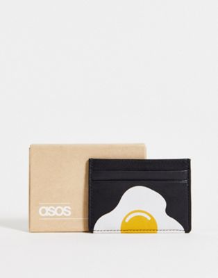 ASOS DESIGN cardholder in black with egg print