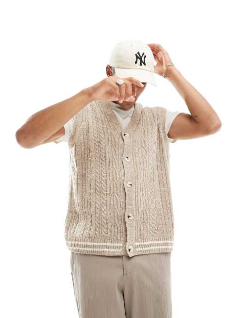 ASOS DESIGN - Cardigan oversize senza maniche da cricket in maglia a trecce color cuoio