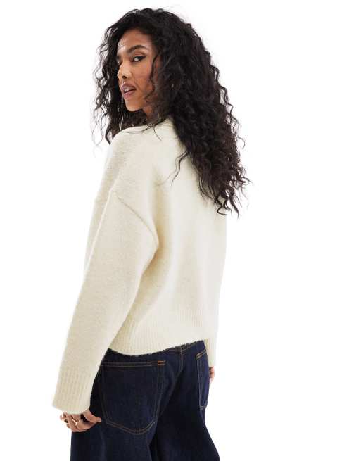 ASOS DESIGN cardigan with fly collar and pocket detail in cream