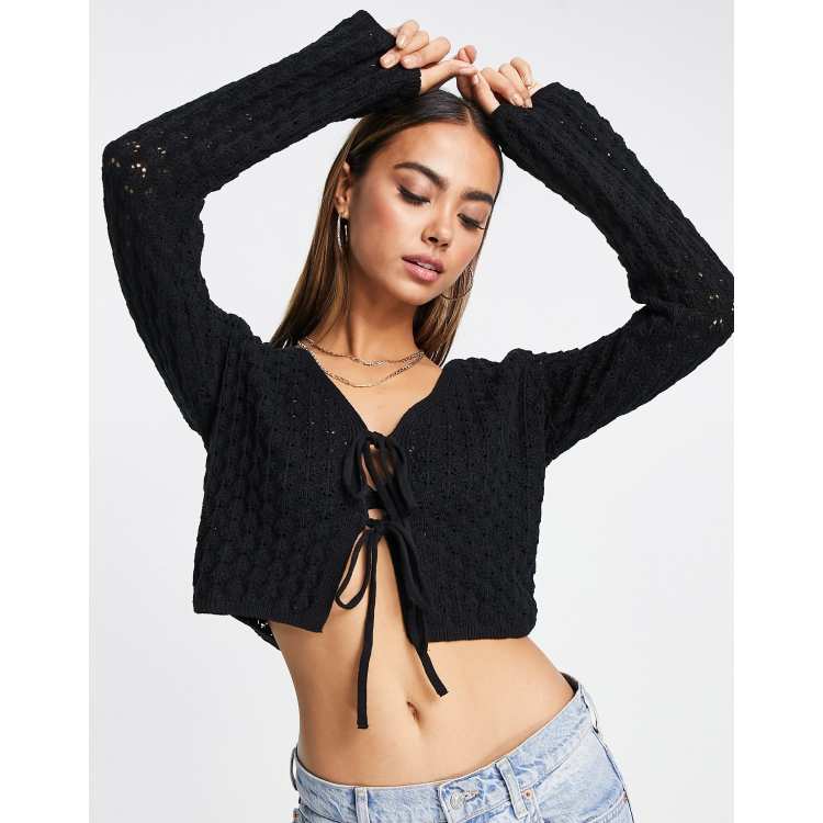 Black tie shop front sweater