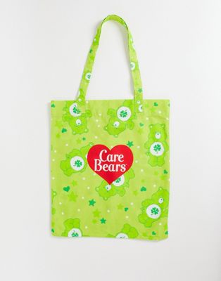 ASOS DESIGN Care Bears lightweight orangic cotton tote bag with all over print in green