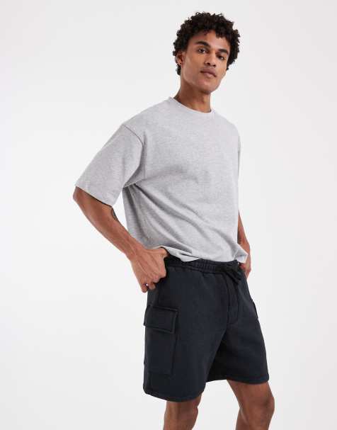 ASOS DESIGN cargo jersey shorts in navy - view 1