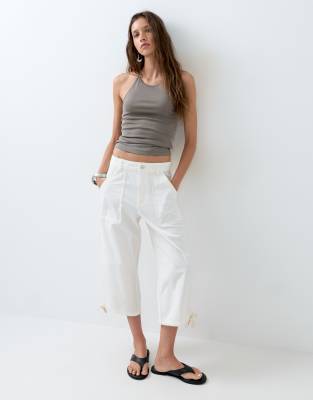 ASOS DESIGN cargo longer short with pocket and tie detail in white