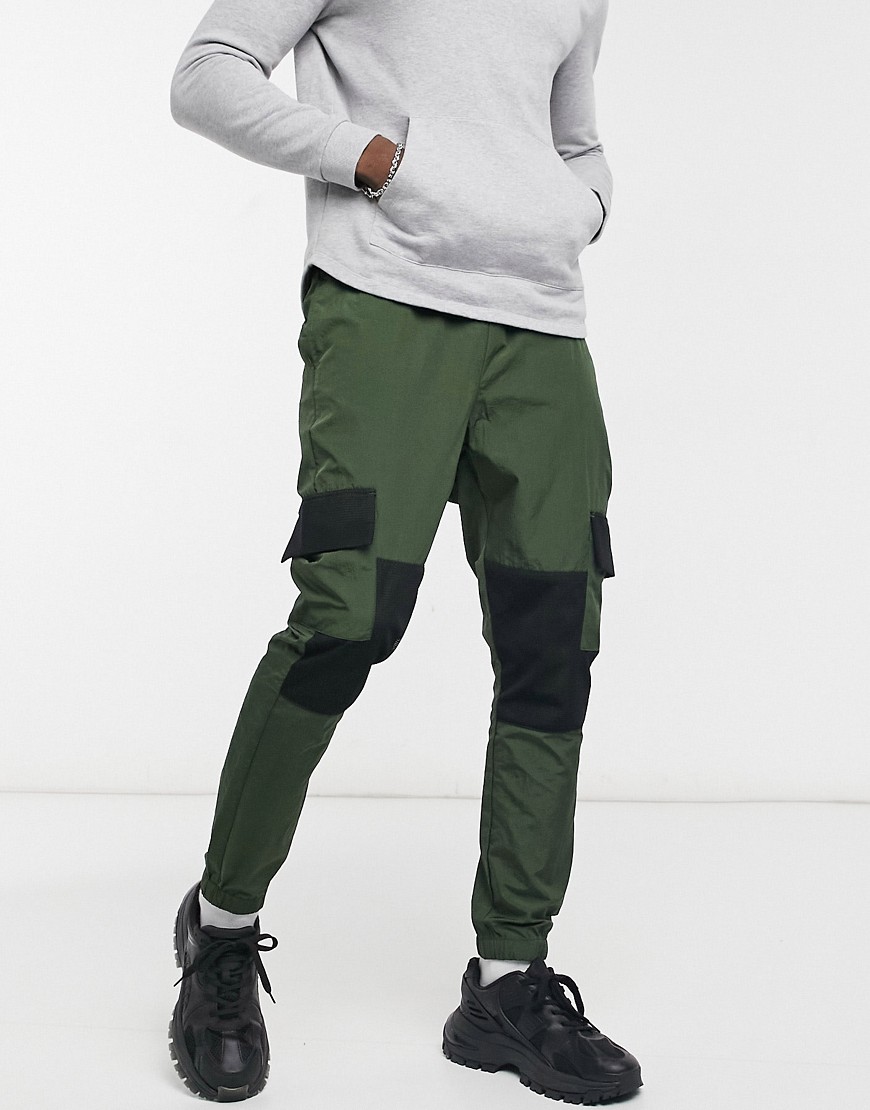 ASOS DESIGN cargo pants in nylon with mesh panels-Green