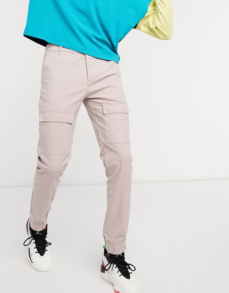 ASOS DESIGN cargo pants in slim fit with ankle zips in pink