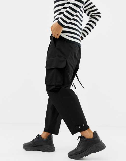 ASOS DESIGN wide leg cargo pants with strapping detail in black