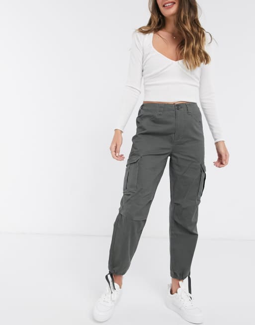 ASOS DESIGN cargo pants with utility pocket in khaki