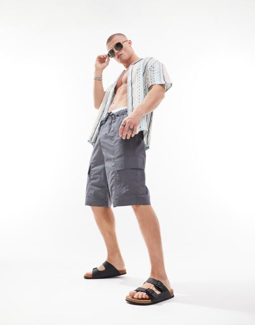 ASOS DESIGN oversized cargo shorts in black acid wash