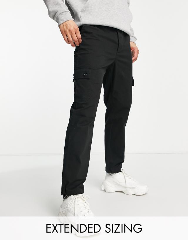 ASOS DESIGN cargo tapered pants in black with toggles