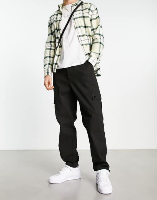 ASOS DESIGN cargo tapered pants in black with toggles