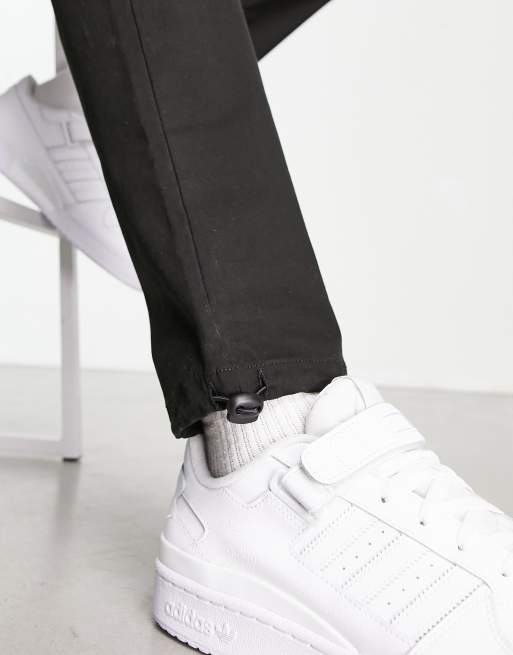 ASOS DESIGN tapered cargo pants in black with toggles