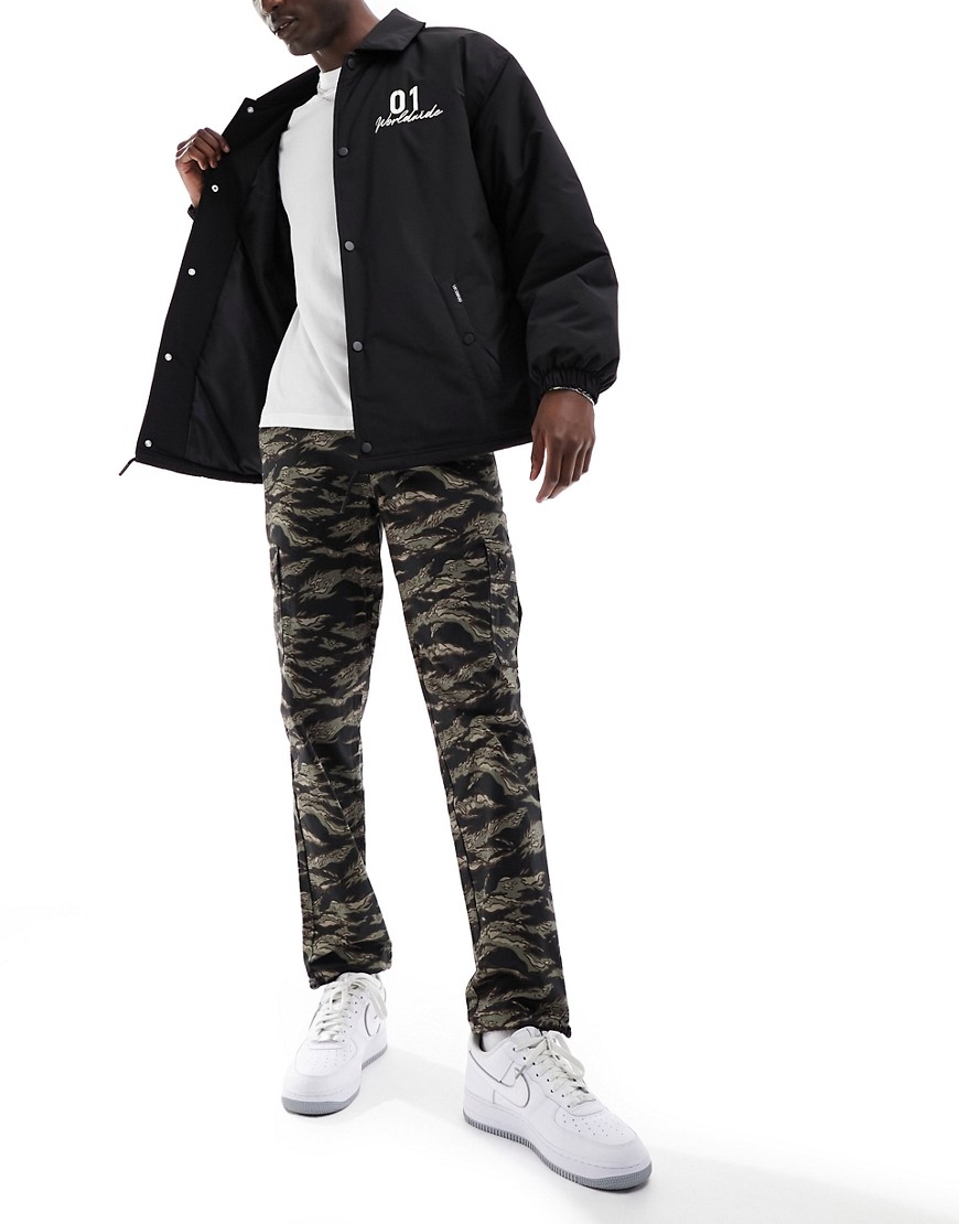 ASOS DESIGN cargo tapered trousers in camo print with toggles-Multi