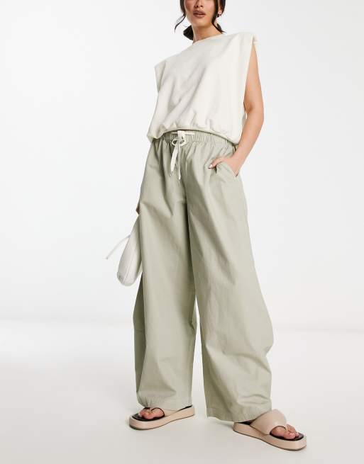 ASOS DESIGN - Cargobroek met parachutepijpen en open zoom in saliegroen