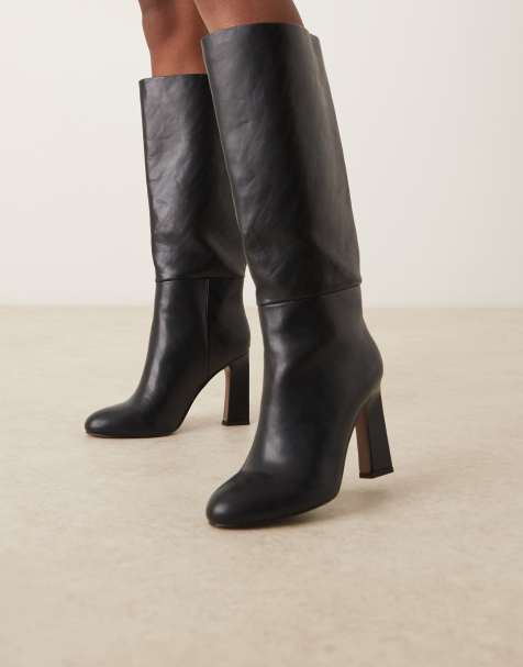 ASOS DESIGN – Carly – Kniehohe Schlupfstiefel in Schwarz mit Blockabsatz - view 1