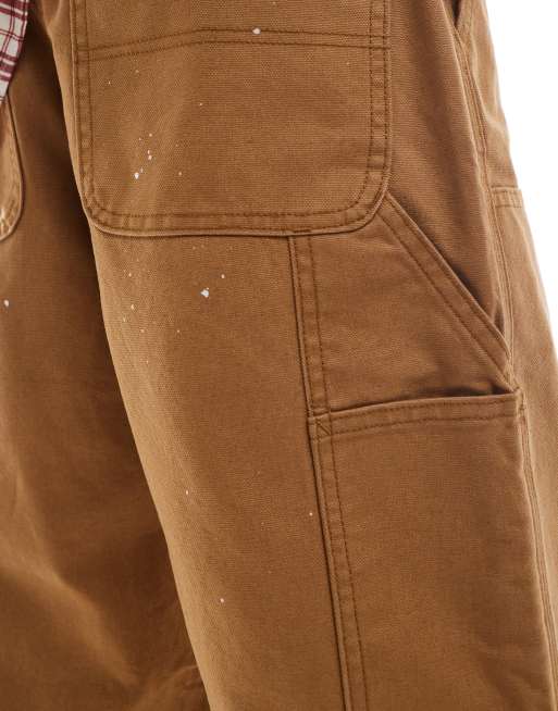 ASOS DESIGN carpenter pants with paint splats in tan | ASOS