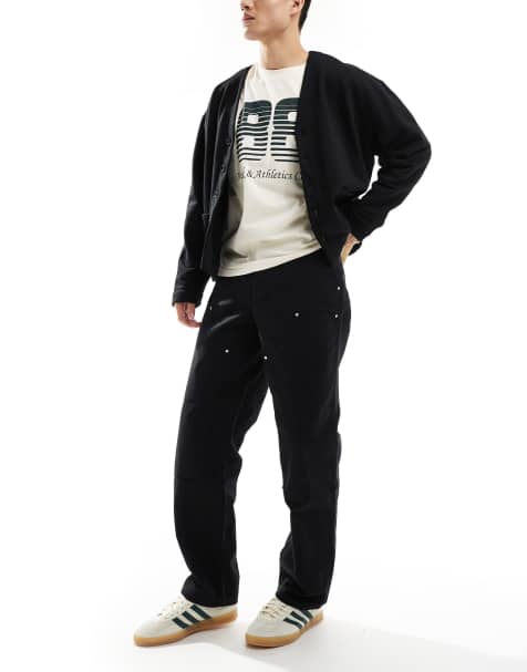 ASOS DESIGN carpenter trouser with rivet detailing in black - view 1