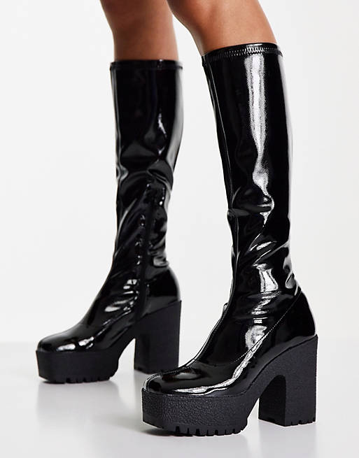 ASOS DESIGN Cashew heeled knee boots in black patent