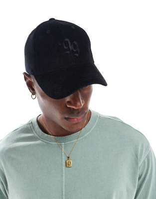ASOS DESIGN - Casquette baseball en velours côtelé à motif - Noir
