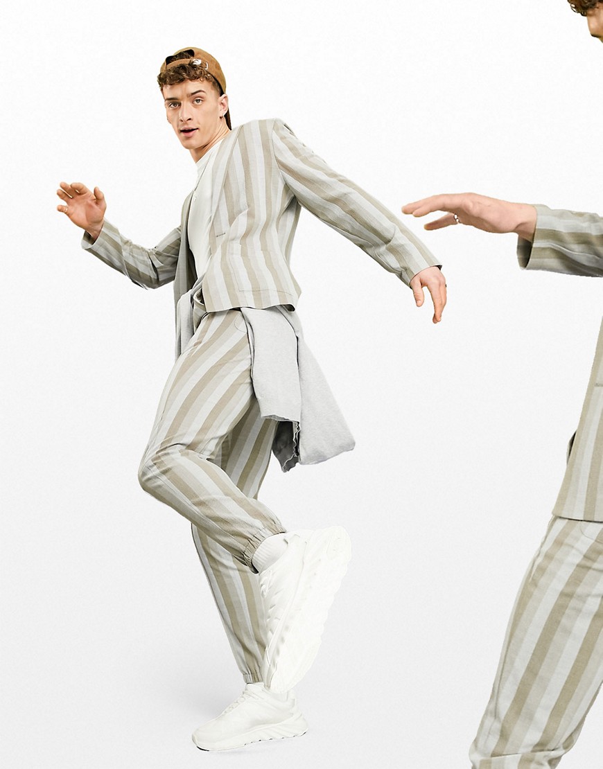 ASOS DESIGN casual skinny suit pants with ecru seersucker stripe and sweatpants cuff-Neutral