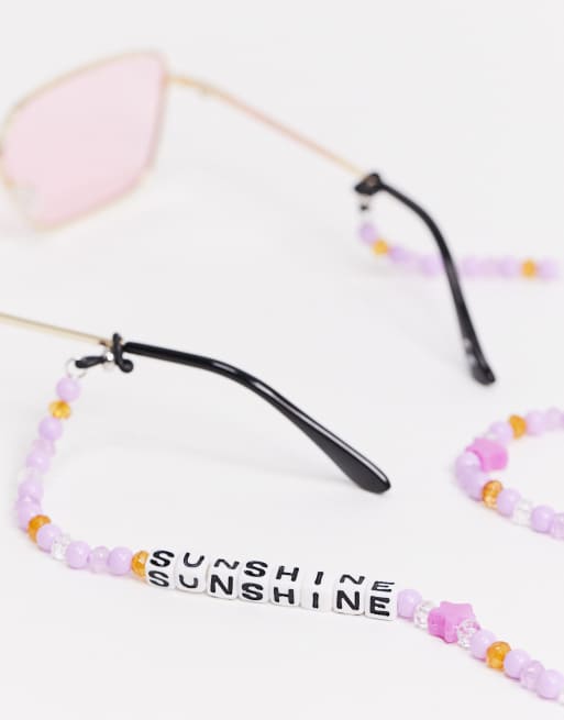 ASOS DESIGN - Catenina per occhiali da sole con perline con scritta 