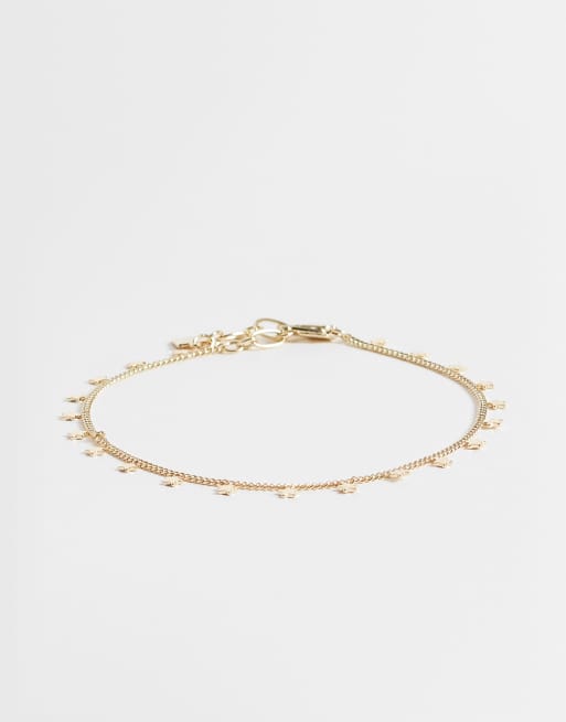 ASOS DESIGN - Cavigliera color oro con ciondolo a stella