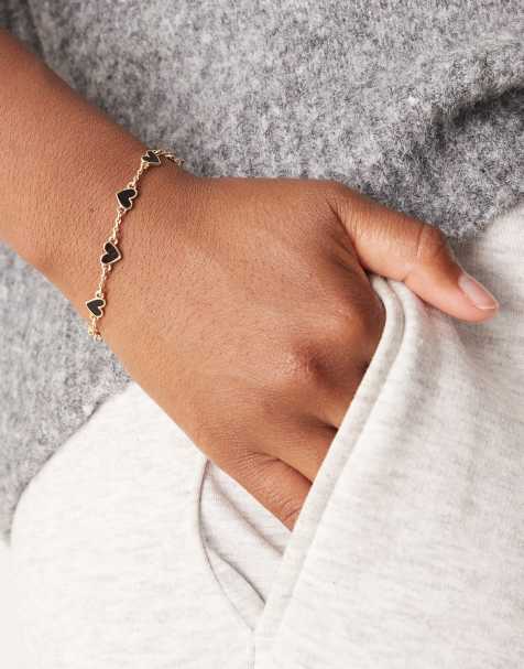 ASOS DESIGN chain bracelet with black enamel heart details in gold tone - view 1