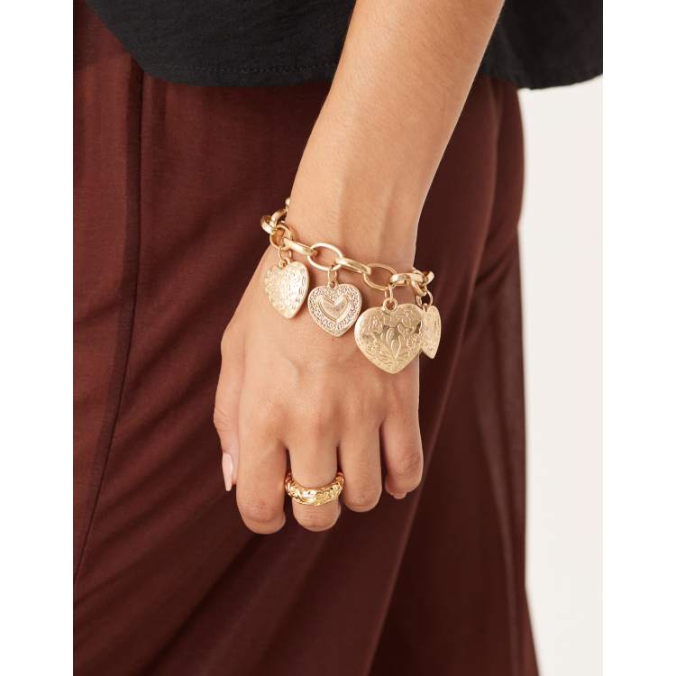 ASOS DESIGN chain bracelet with heart charms in worn gold