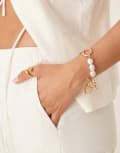[ASOS DESIGN] ASOS DESIGN chain bracelet with t-bar and faux pearl details in gold tone No Size GOLD