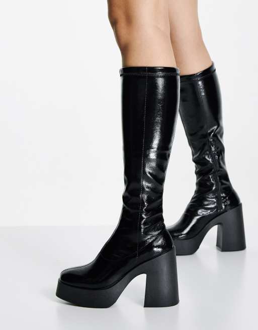 ASOS DESIGN Challenge chunky high heeled knee boots in black patent