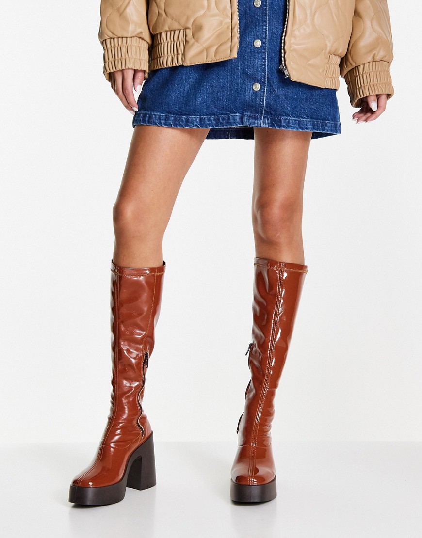 ASOS DESIGN Challenge chunky high-heeled knee boots in brown patent