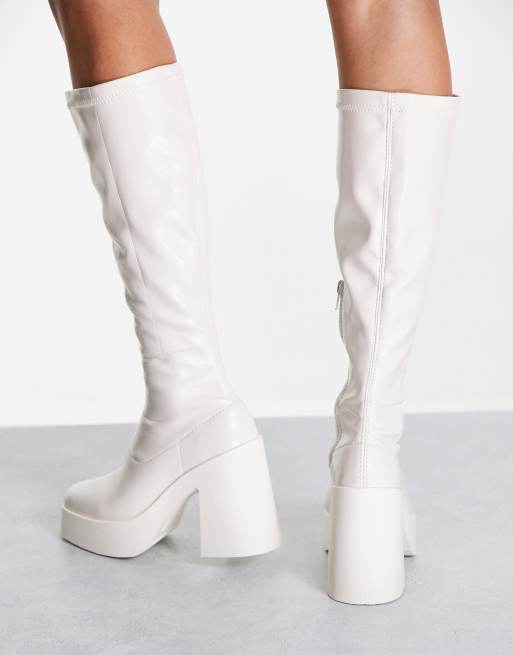ASOS DESIGN Challenge chunky high heeled knee boots in white patent