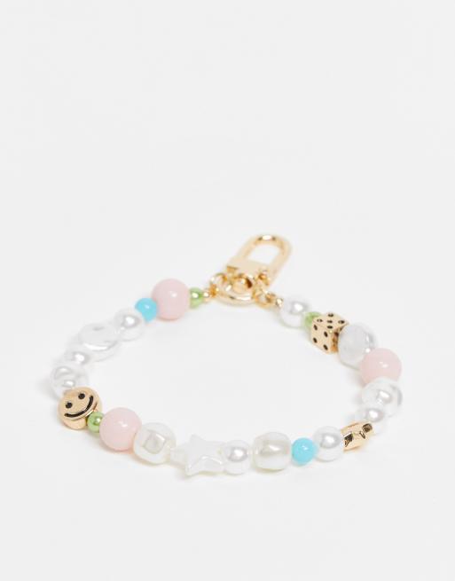 ASOS DESIGN - Charm per borsa in colorazioni pastello con faccina sorridente e dado