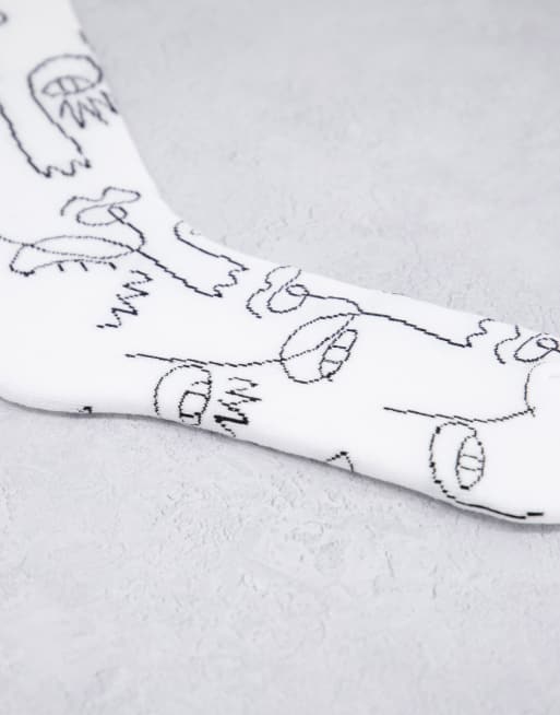 ASOS DESIGN Chaussettes de sport avec visage dessin la main