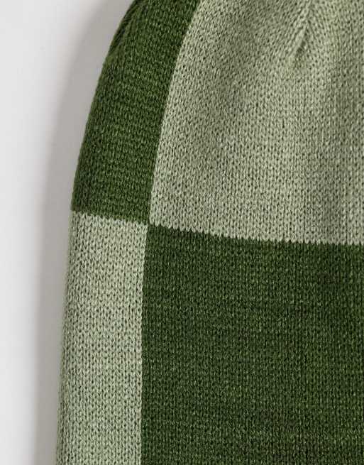 ASOS DESIGN checkerboard and striped pattern reversible skull beanie in green, 2 of 3