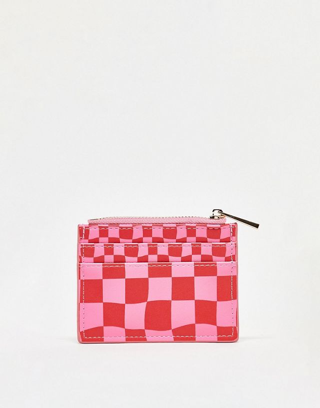 ASOS DESIGN checkerboard cardholder in pink and red