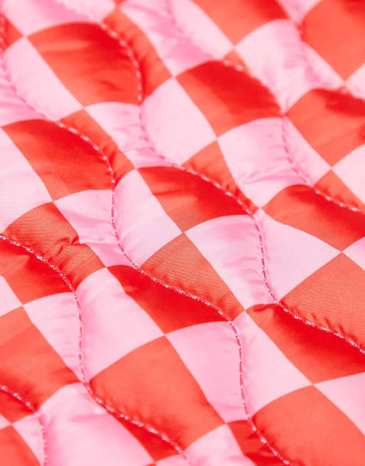 ASOS DESIGN checkerboard laptop sleeve in pink and red