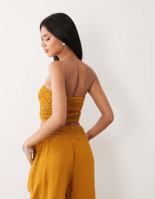 ASOS DESIGN cheesecloth shirred bandeau top in gold, 4 of 4