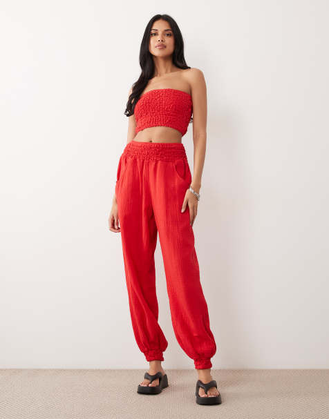 ASOS DESIGN cheesecloth shirred jogger in red - view 1