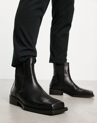 ASOS DESIGN chelsea boot in black leather with angled sole